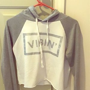 Cropped sweatshirt says vibrant on front